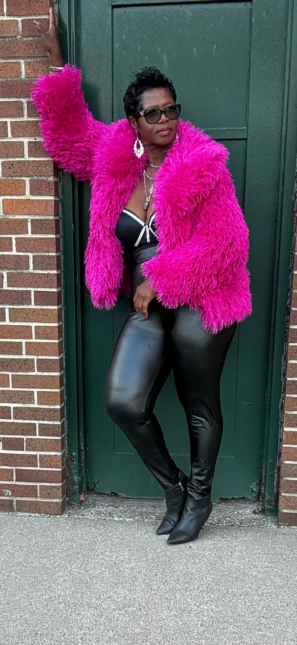 Tasha has a pink furry jacket